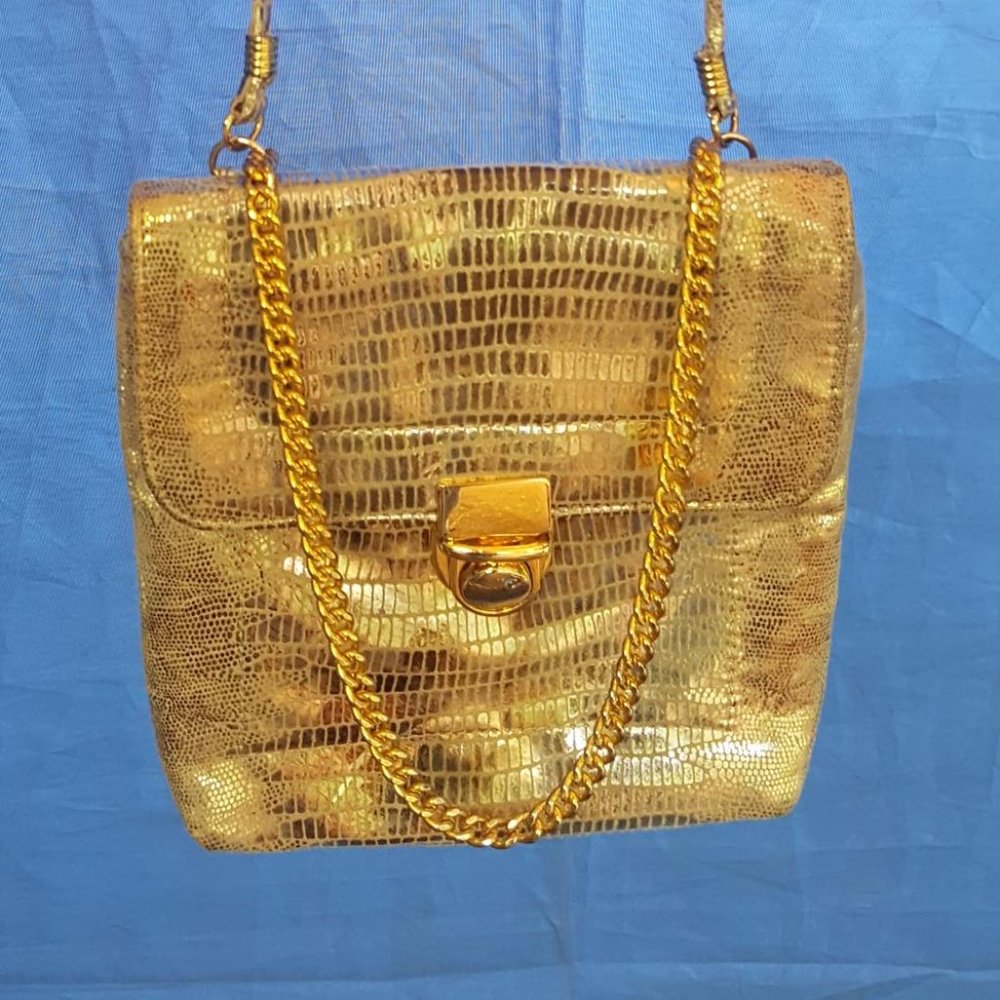 Bags by Pinky...gold gam bag